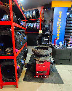 Fouji Tyres fitting bay with tyre changer